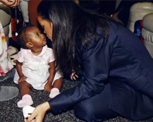 e70d6090-b16e-11e4-9cc1-b1ae93d0a511_Rihanna-Majesty-2